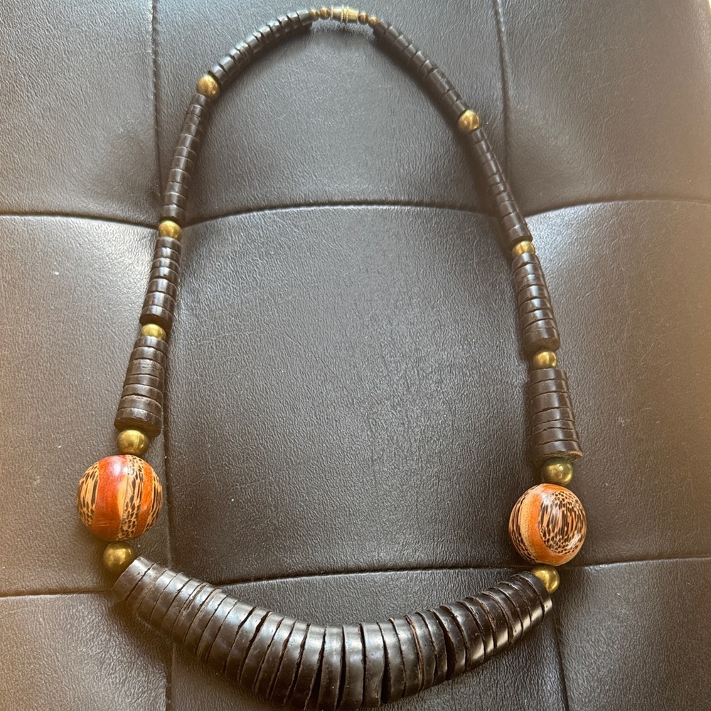 1970’s Tribal necklace featuring black heishi beads and large round beads.